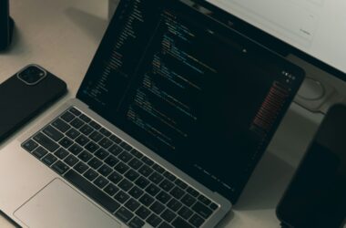 Laptop screen showing code at a developer workstation