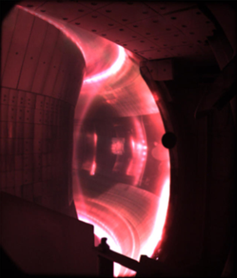Fusion plasma glowing inside the Experimental Advanced Superconducting Tokamak