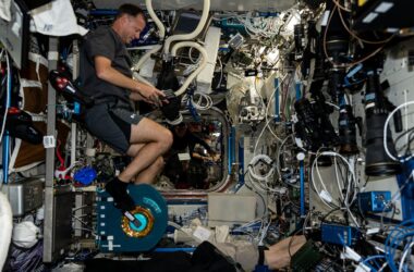 NASA astronaut Nick Hague exercising on the International Space Station, representing astronaut health care and local AI medical support for deep space missions