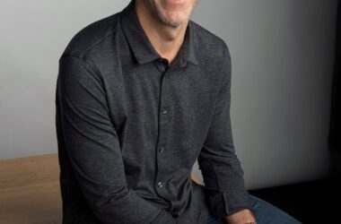 John Ternus, Apple's incoming CEO, seated for an official Apple portrait