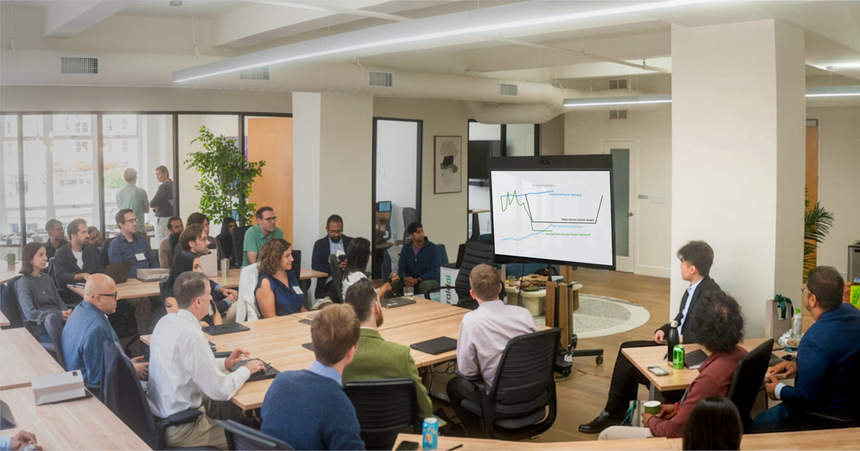 Emerald AI and NVIDIA teams monitoring an automated power reduction at a Silicon Valley AI data center
